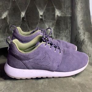 Nike purple suede sneakers. Never worn them for working out. Size 10